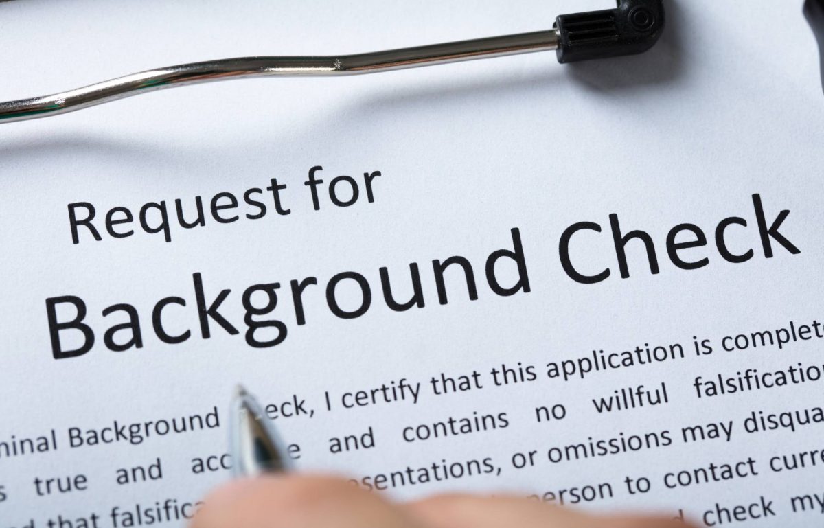 Close up of a sheet of paper with the words "Request for Background Check" across the top in big letters.